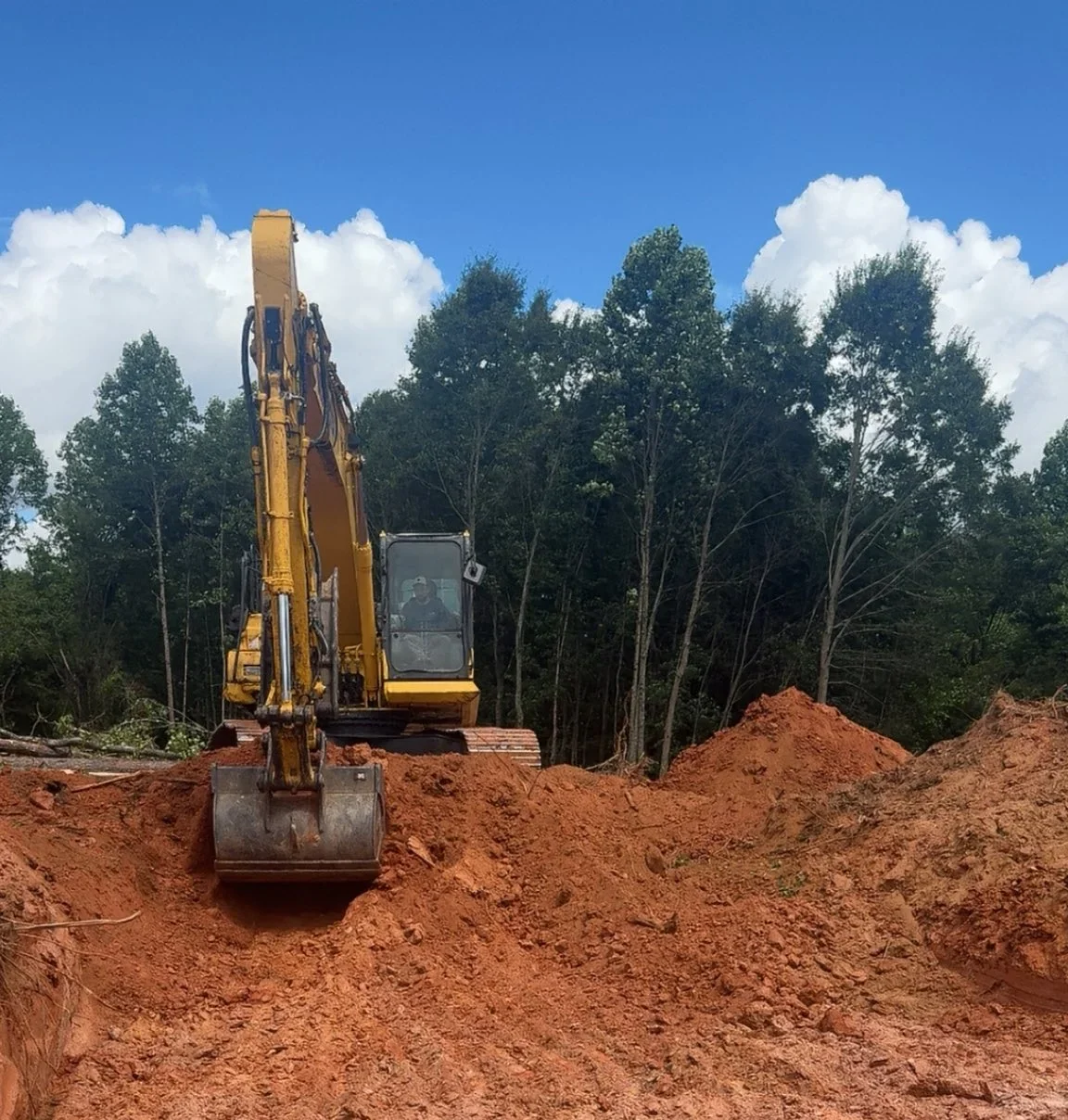 Heavy equipment performing large-scale earthwork in Northwest Georgia